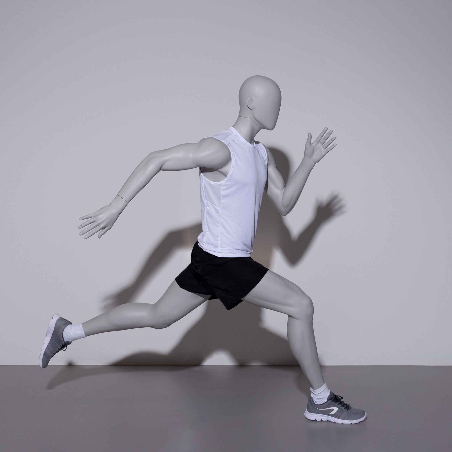 BINK - Sprinting sport mannequin, male, grey, abstract head, standing pose 305