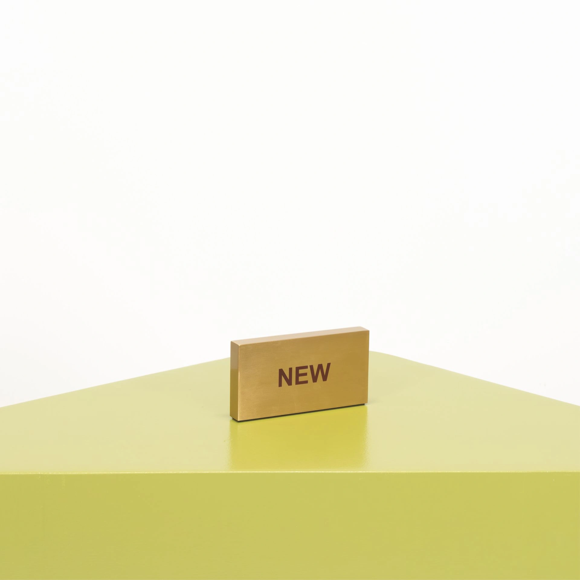 BINK - Bloc de présentation "NEW", en acier brossé finition or